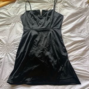 Black Laura’s boutique Olivia satin dress slit